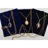 THREE GEM SET NECKLACES, the first an oval cut topaz, collet set in yellow gold with rope surround
