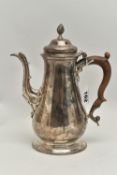 A GEORGE II SILVER COFFEE POT, polished form, fitted with a light brown wooden scroll handle,