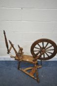 A BEECH SPINNING WHEEL (condition report: -in working order)