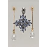A GEM SET PENDANT AND A PAIR OF EARRINGS, the 9ct white gold pendant of a star design, set with