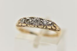 A YELLOW METAL FIVE STONE DIAMOND RING, set with five graduated old cut diamonds, each claw set in a