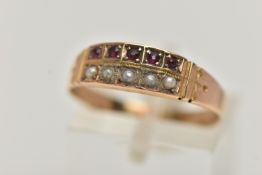 A LATE VICTORIAN 15CT GOLD GEM SET RING, the tapered band, set with a row of five circular rubies