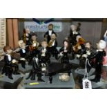 A THIRTEEN PIECE ART GLASS ORCHESTRA, bearing 'L&M Hlavackovi Glass Figurines' stickers,