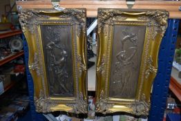 TWO BRONZED ART NOUVEAU STYLE WALL PLAQUES, both depicting a female figure and a cherub, one inset