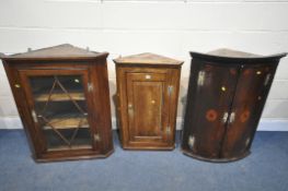 THREE VARIOUS GEORGIAN OAK CORNER CUPBOARD, including a bowfront two door cabinet, a small fielded