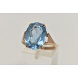 A 9CT GOLD TOPAZ DRESS RING, large oval cut light blue topaz, measuring approximately 16.2mm x 12.