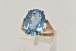 A 9CT GOLD TOPAZ DRESS RING, large oval cut light blue topaz, measuring approximately 16.2mm x 12.