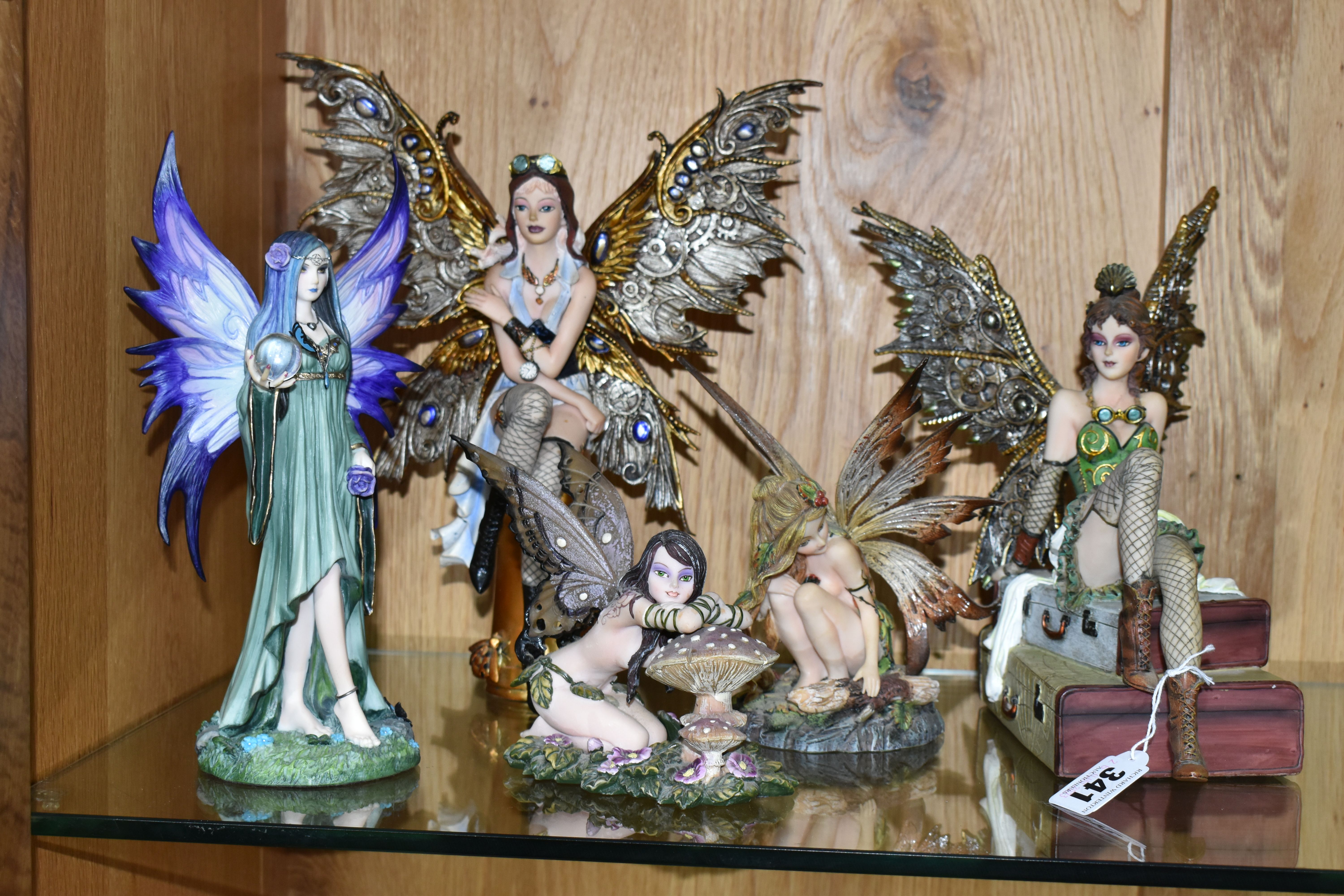 FIVE NEMESIS NOW RESIN FIGURES, of fairies in woodland settings, with a crystal ball, and with