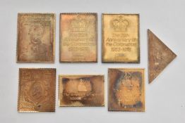 SEVEN COMMEMORATIVE SILVER STAMPS, gilt silver, each with a full silver hallmark for London