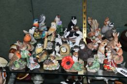 A COLLECTION OF BORDER FINE ARTS ANIMAL AND BIRD SCULPTURES, thirty small figures, many from the