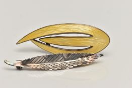 TWO WHITE METAL BROOCHES, the first a 'Askel Holmsen' brooch with yellow guilloche enamel detail,