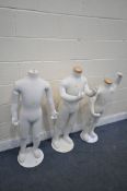 THREE ARTICULATED CHILDREN SHOP DISPLAY MANNEQUINS, on a separate metal base, max height 106cm (