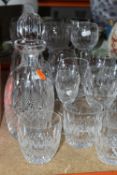 A SUITE OF WATERFORD CRYSTAL, in Colleen pattern, comprising a round decanter, six hock glasses, six