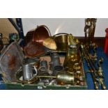 ONE BOX OF METAL WARE, to include a pair of carved mahogany bellows, three brass pans, a large