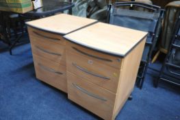 A PAIR OF MODERN BEECH THREE DRAWER OFFICE CABINETS (four key)