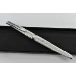 A 'WATERMAN' FOUNTAIN PEN, brushed effect, signed 'Waterman C/F, Made in France, fitted with a white