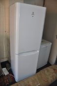 A TALL WHITE INDESIT FRIDGE FREEZER, height 175cm (PAT pass and working)