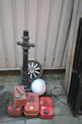 A PAINTED CAST IRON LANTERN, with a later plastic shade, height 111cm, along with four petrol