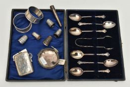 A BOX OF ASSORTED SILVER ITEMS, to include a cased set of six teaspoons with a pair of sugar