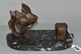 AN ART DECO INKSTAND DECORATED WITH FISH, having a dark grey marble base with pen rest, surmounted