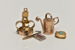 FOUR MAINLY VICTORIAN CHARMS, to include a diamond and ruby set flag, set with a central square