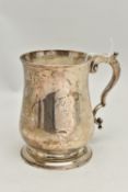 A GEORGE III SILVER TANKARD, polished bell shape tankard, fitted with a scrolling handle, hallmarked