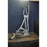 AN UNBRANDED EXERCISE MACHINE height 150cm