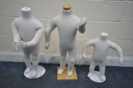 THREE ARTICULATED TODDLER SHOP DISPLAY MANNEQUINS, on a separate metal base, max height 106cm (