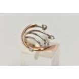A BI-COLOUR DIAMOND DRESS RING, rose and white metal spray design set with five claw set round