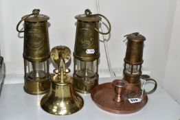 THREE BRASS MINER'S LAMPS, BELL AND COPPER CHAMBER STICK, comprising two Type 6 M&O safety lamps -