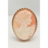 A 9CT GOLD CAMEO BROOCH, large oval brooch, carved shell cameo depicting a lady in profile, collet