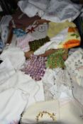 THREE BOXES OF VINTAGE LINENS, to include embroidered, crocheted, printed and woven table cloths,