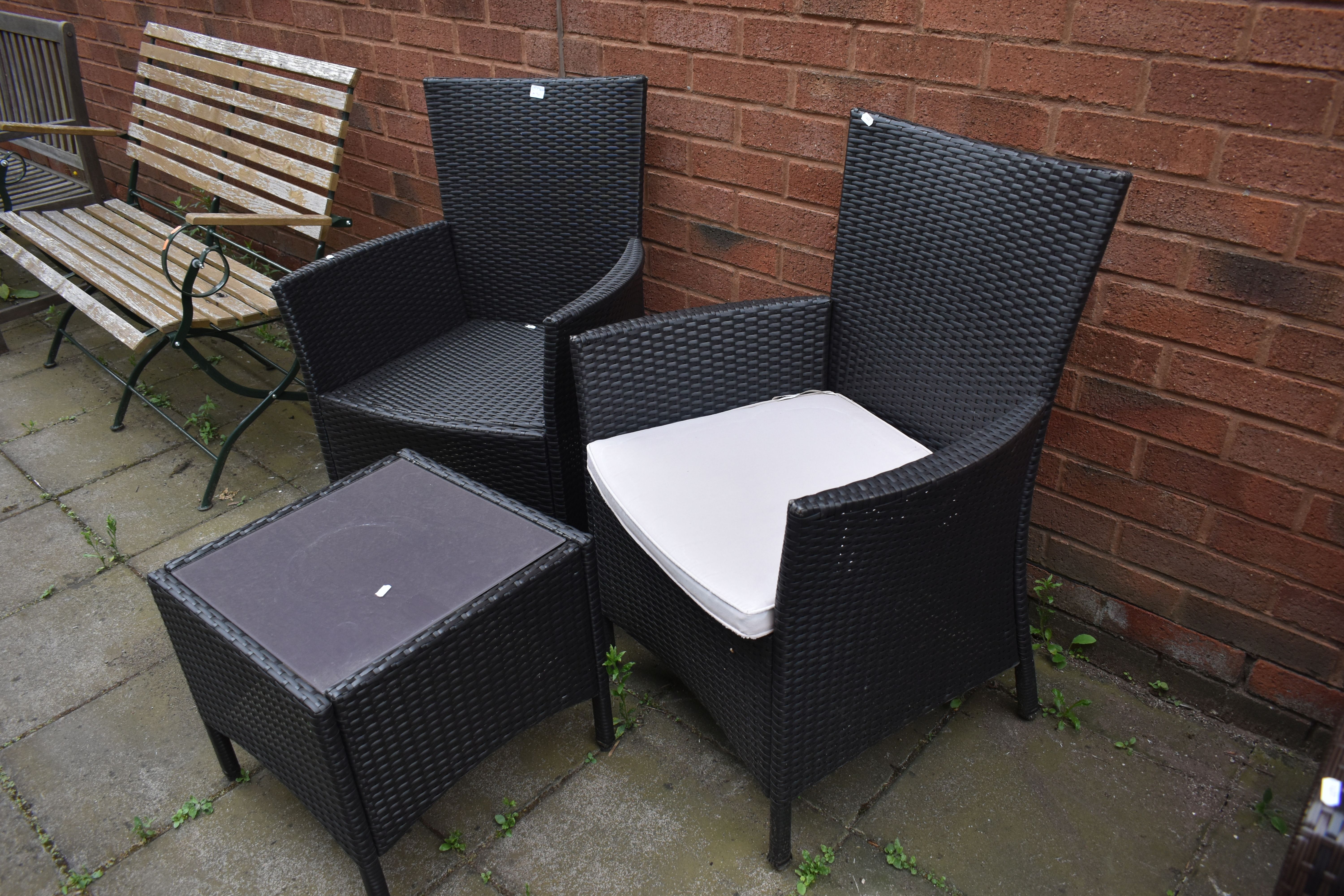 A PAIR OF PLASTIC RATTAN GARDEN ARMCHAIRS, and a matching coffee table (3) - Image 2 of 2