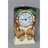 NICOLA SLANEY FOR MOORCROFT, a mantel clock decorated in the 'Anna Lily' pattern, height 15cm (5) (