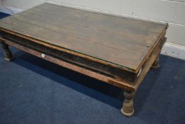 AN ANGLO-INDIAN HARDWOOD RECTANGULAR COFFEE TABLE, incorporating older timbers ornately carved