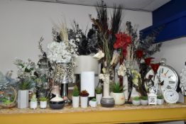 A LARGE QUANTITY OF FAUX FLOWERS, LAMPS AND MODERN WALL CLOCKS, comprising three table lamps,