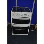 A CANNON CARRICK GAS COOKER with four burners. grill and oven width 60cm x depth 65cm x height 91cm