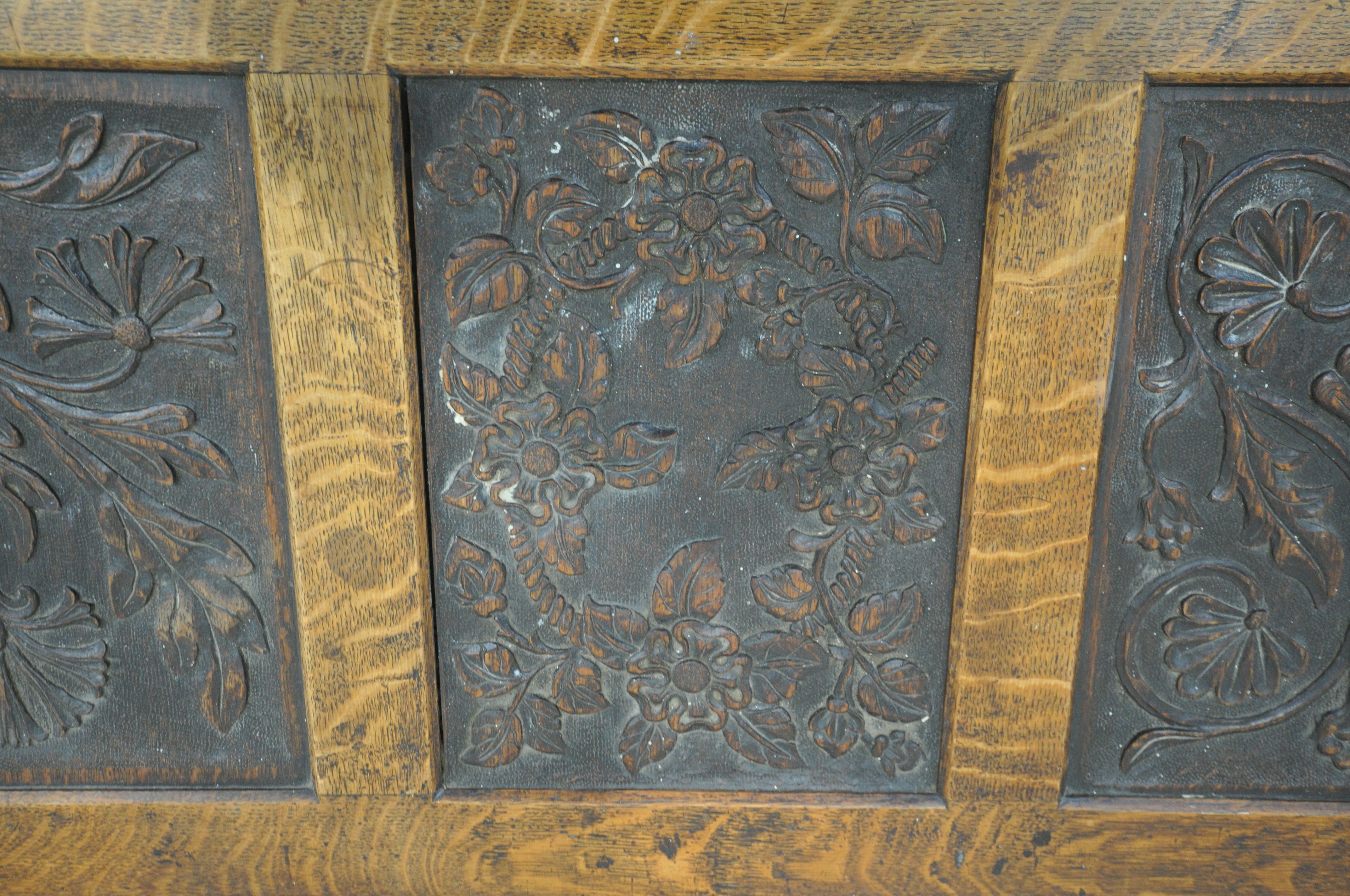 AN EARLY 20TH CENTURY OAK COFFER, decorated with nine foliate carved panels, width 122cm x depth - Image 5 of 6