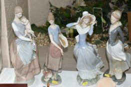 FOUR LLADRO FIGURES, comprising Peaceful Moment depicting a mother and child, model no 6179,