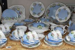 AN EIGHTY THREE PIECE HANDPAINTED DINNER SERVICE, hand painted with flowers on Shelley blanks,
