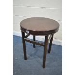 A MID CENTURY BAKELITE CIRCULAR OCCASIONAL TABLE, on a stained wooden base, diameter 55cm x height