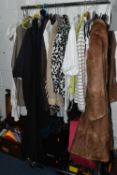 FIVE BOXES AND ONE RAIL OF CLOTHING AND ACCESSERIES, to include a ladies fur coat, a handmade