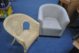 A MODERN GREY UPHOLSTERED TUB CHAIR, along with a wicker basket chair (condition report: -good) (2)
