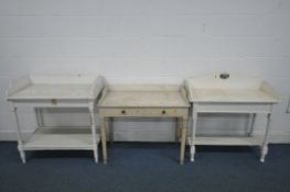 THREE 19TH CENTURY PAINTED PINE WASHSTANDS, with a raised back and sides, including one with two