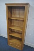 A SOLID LIGHT OAK OPEN BOOKCASE, with three adjustable shelves, over a single drawer, width 75cm x