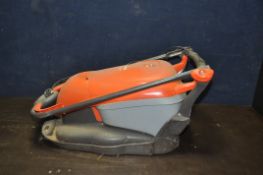 A FLYMO HOVER COMPACT 300 ELECTRIC LAWN MOWER (untested and no cable)