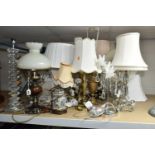 A QUANTITY OF TABLE LAMPS, comprising three brass lamp bases, six clear glass and acrylic lamp