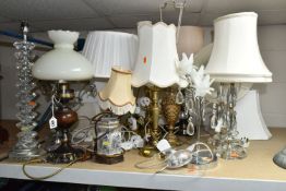 A QUANTITY OF TABLE LAMPS, comprising three brass lamp bases, six clear glass and acrylic lamp