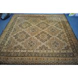 TWO MACHINE WOVEN KESHAN GOLD RUGS, 319cm 273cm (condition report: -side and end fraying) (2)