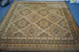 TWO MACHINE WOVEN KESHAN GOLD RUGS, 319cm 273cm (condition report: -side and end fraying) (2)